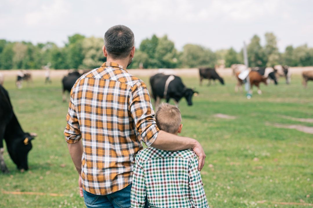 Dairy farmer and son